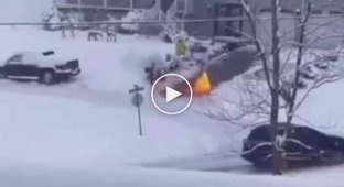 Man uses flamethrower to shovel snow