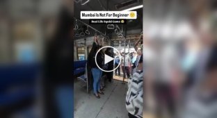 Girls in Mumbai jump on a moving train