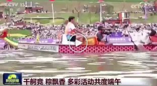 Robots compete in a boat race