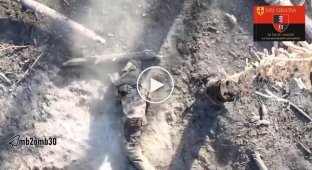 The body of the occupier is burning from the release of ammunition by soldiers of the 30th Mechanized Infantry Brigade.