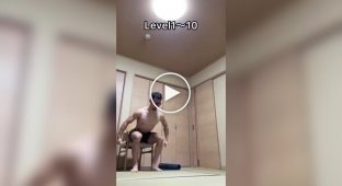 A man performs jumps to different levels while holding 8 kg dumbbells