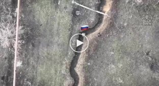 An occupier in a trench gestures for cigarettes from his drone, but receives a mine from a Ukrainian