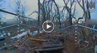 A Ukrainian kamikaze drone flies into a Russian dugout near Gorlovka in the Donetsk region