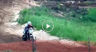 In the Urals, during a motocross, a father ran out onto the track and cuffed his young son-racer