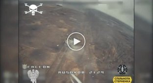 The drone hits an enemy BTR-82A with occupiers on its armor
