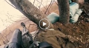A fighter of the International Legion of the Ukrainian Armed Forces fights with the invaders