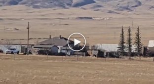 A storm with gusts up to 230 km/h (145 mph) overturned freight train cars in the US