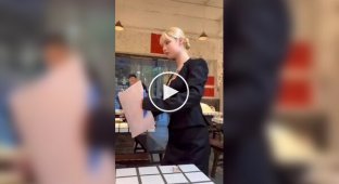 In one of the cafes Waitresses move like robots