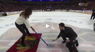 This is how model Cindy Crawford handles a puck and stick