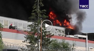 A defense enterprise producing electronics for missiles is on fire in Yekaterinburg, Russia