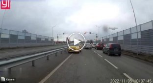 A motorist in a small yellow car ended up in the oncoming lane