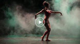 The girl has perfect control of her body in this unusual dance.
