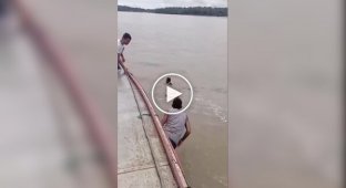 Rescuing a girl from a river in Brazil