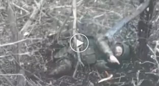 An occupier with his legs torn off finishes himself off with a grenade