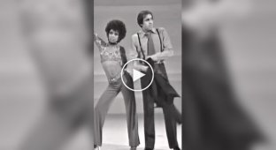 Pair dance: Celentano and a girl perform the legendary dance in sync