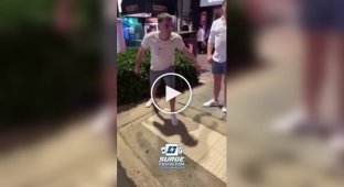 A man suffered a concussion after hitting his head on a sign in a flowerbed