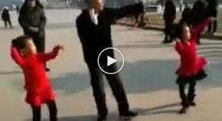 Grandfather and granddaughters dance beautifully and lift the spirits of those around them