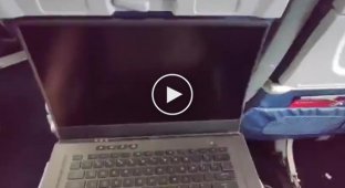 Don't put your laptop on a table on an airplane