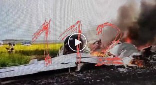 Russian Tu-22M3 burns out in a field after crashing