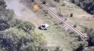 A Russian tank shatters after an attack from an American Javelin anti-tank missile system