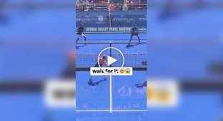 A pickleball player crashed into a glass wall