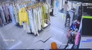 A burst underground pipe turns a clothing store into a sewer swamp
