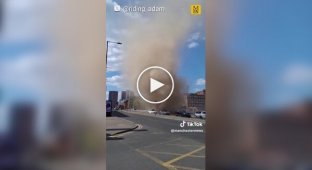 A swirling "dust devil" swept through Manchester