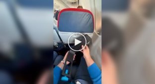 An armrest for a passenger seat on an airplane