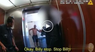 Man with knife against police in elevator