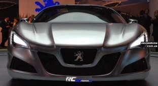 Гибридный 4-дверный купе от Peugeot представлен публике (12 фото)