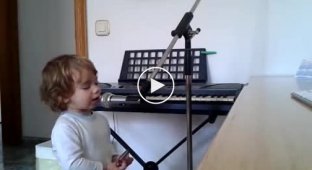 Dad started playing the guitar, and the little kid decided to help dad