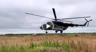 A pair of Ukrainian Mi-8 combat helicopters, at very low altitudes, almost touching the black soil, work on Russian targets