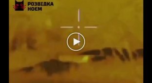 Український снайпер стріляє у російського солдата, що риє яму. Опубліковано у січні 2024 р., місцезнаходження невідоме