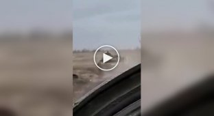 A missile from an American FGM-148 Javelin ATGM a moment before hitting a Russian tank