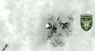 A Ukrainian drone with a thermal imager drops ammunition on Russian military personnel in the Lugansk region