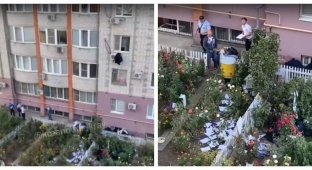 Женщина, узнавшая об измене мужа, стала выкидывать все его вещи из окна… прямо на полицию и казаков (3 фото + 1 видео)