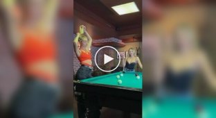 Very serious girls who play billiards well
