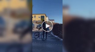 Unusual way of riding together on one bike