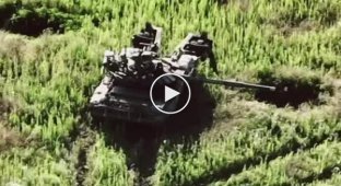 An abandoned Russian T-72B3 tank with a KMT-7 mine-roller complex was destroyed by a Ukrainian Javelin ATGM