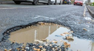 A motorist compiled a dossier on 250 potholes (3 photos)