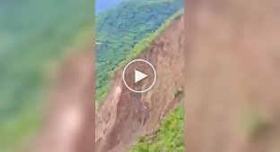 A massive landslide destroyed a section of a mountain road