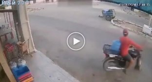 The truck overturned onto a motorcycle and miraculously did not crush its owner