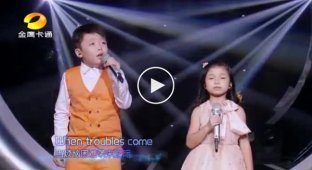 10-летний Джеффри Ли и 7-летняя Селин Там спели чудесную песню Джоша Гробана