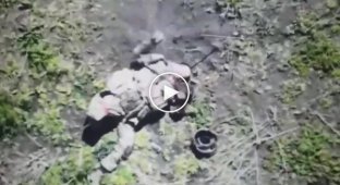 A Russian puts a grenade under his bulletproof vest and blows himself up