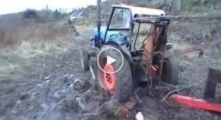 Как вытащить трактор из болота?