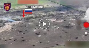 A tank crew of the 115th Mechanized Infantry Brigade destroys a Russian armored personnel carrier with direct fire in the Donetsk region
