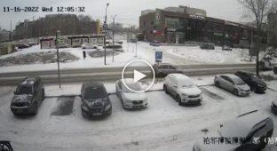 Car hitting a woman at a pedestrian crossing in Omsk