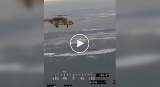 The crew of the Mi-17 helicopter flies a parallel course with the Russian-Iranian kamikaze drone Shahed and shoots it down