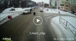 A driver hits a woman at a pedestrian crossing