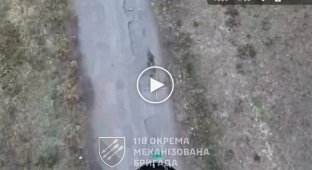 A Russian accidentally hits himself in the head while trying to hit a drone with a machine gun